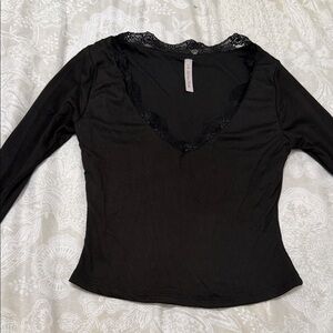 Chic Black Long Sleeve Top with Lace Detail
